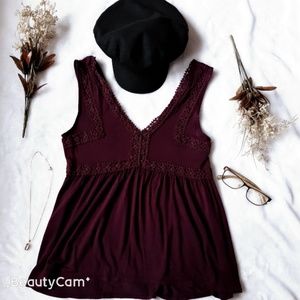 A flare top with knit detailing